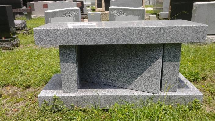 This lovely grey stone bench is the perfect way to honor the loss of your loved one. 